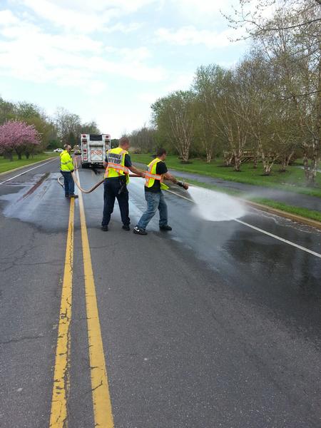 Firefighter Keith Kauffman, Deputy Chief Dan Donnachie and firefighter Steve Johnson washing down GO Carlson BLVD.  5.4.14