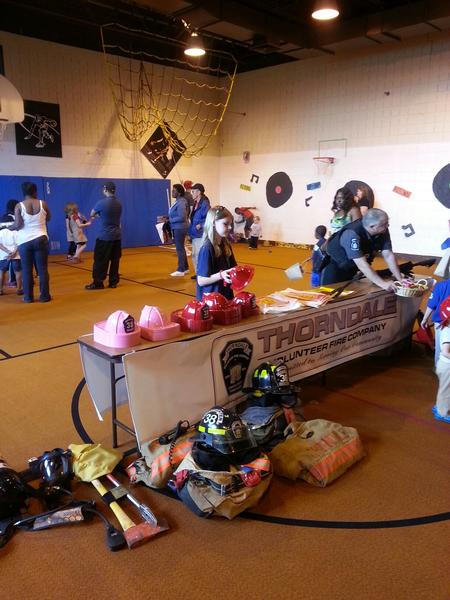 Caln Elementary School May Fair.  Gia Barron tending to the company table.
