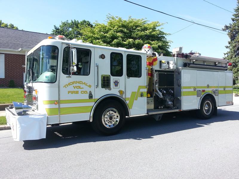 Sparky riding Engine 38 at the Downingtown Memorial Day Parade. 5.26.14