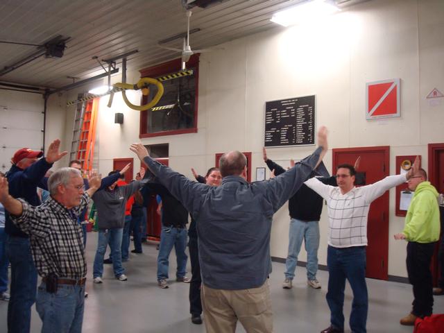 Thorndale Fire Police Captain Patrick Carmody, in center,  instructs one of the groups in giving hand signals.